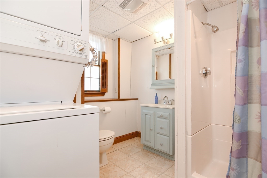 127 Haverhill Road Amesbury, MA 01913 - Photo 36 of 42 a utility room with closet dryer and washer