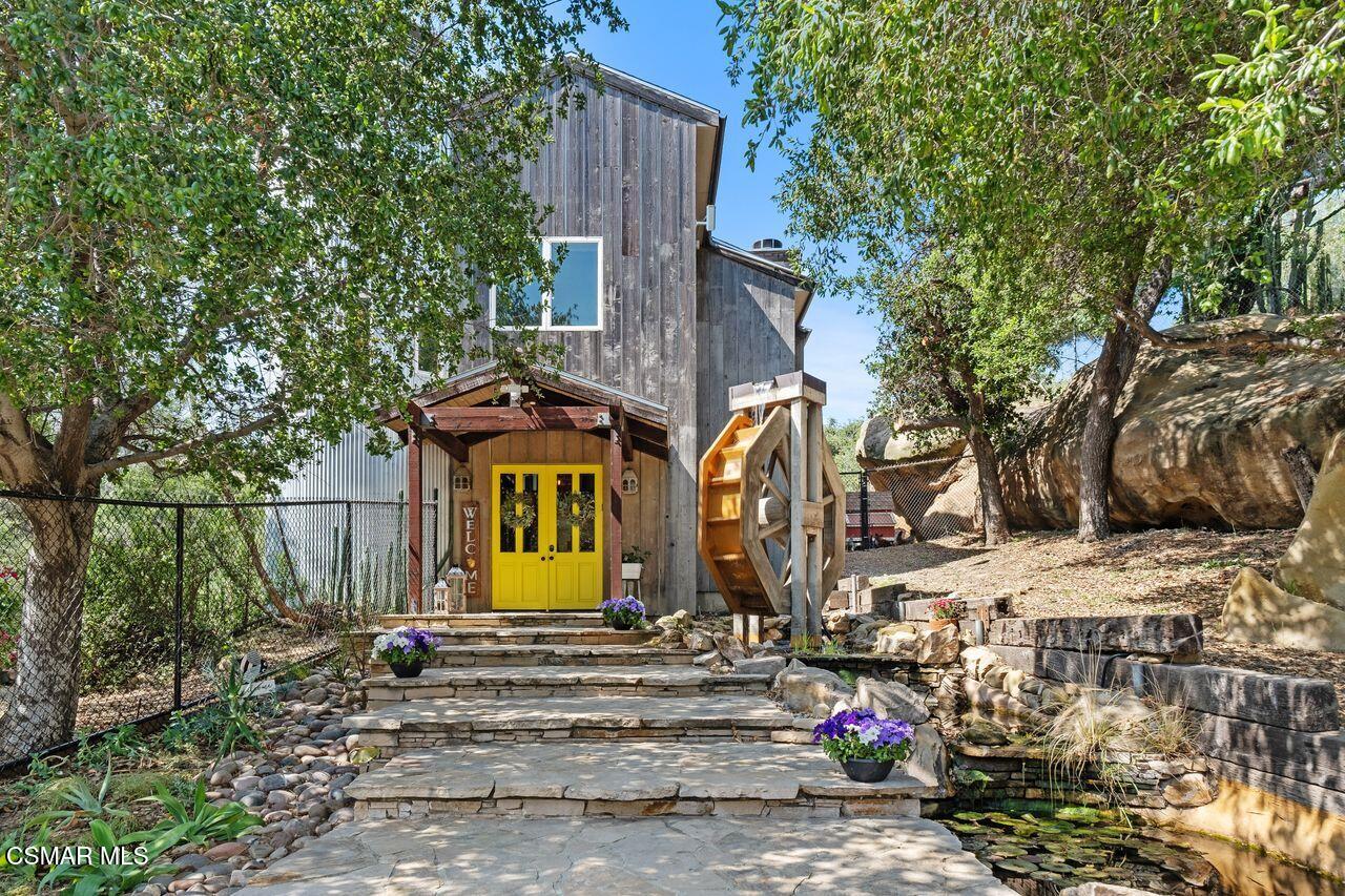a view of a park with large trees