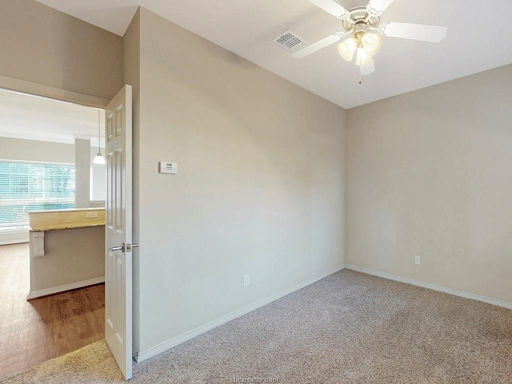 1198 Jones-Butler Road, Unit 2607 College Station, TX 77840 - Photo 11 of 26 an empty room with a bathroom and a sink