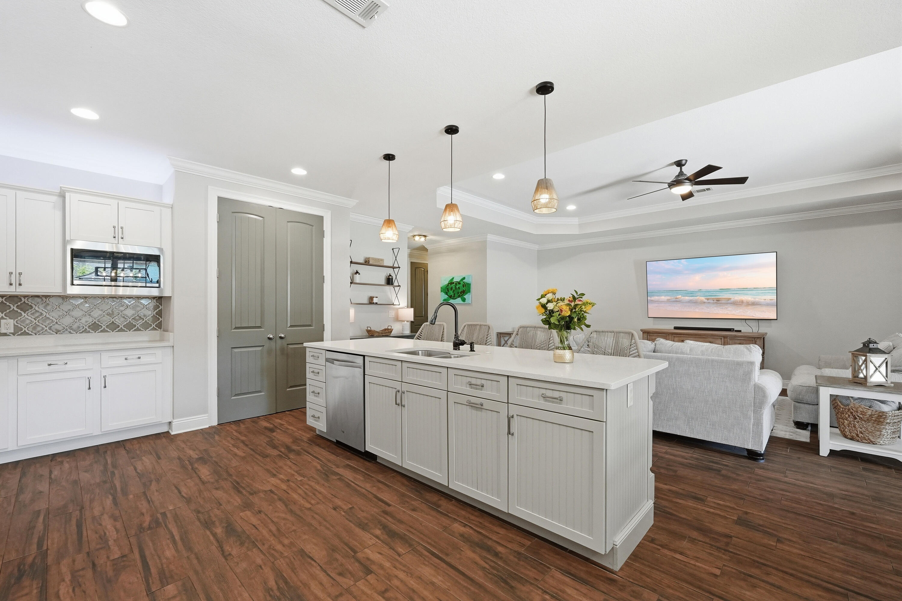 38 Marlborough Road Shalimar, FL 32579 - Photo 15 of 68 a kitchen with white cabinets and white appliances
