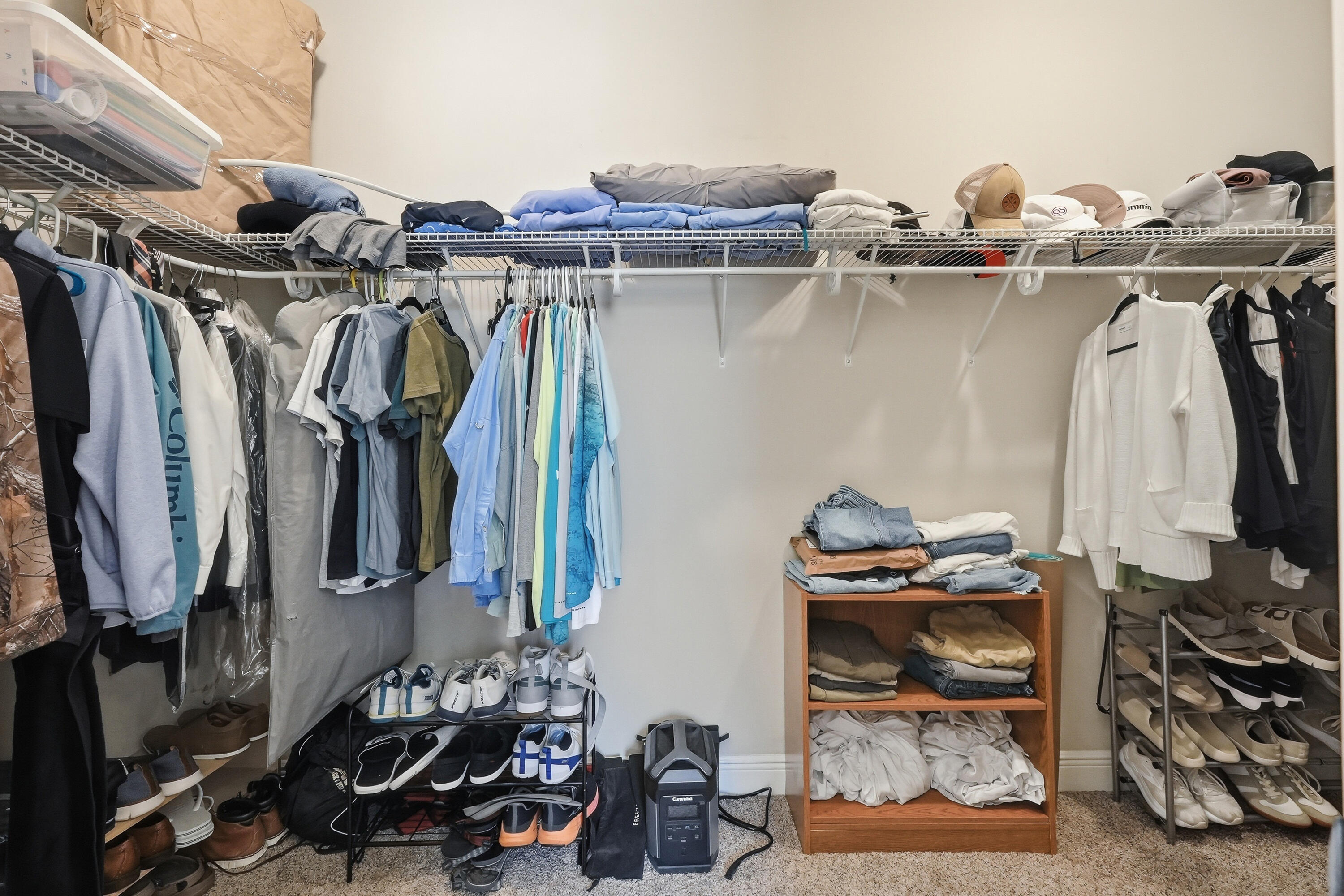 38 Marlborough Road Shalimar, FL 32579 - Photo 33 of 68 a view of walk in closet with clothes and shoes
