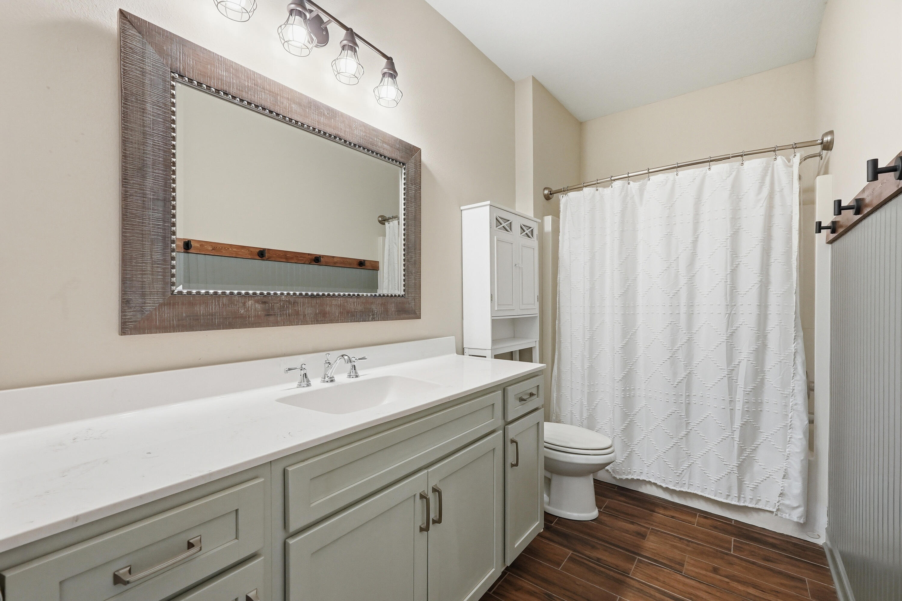 38 Marlborough Road Shalimar, FL 32579 - Photo 48 of 68 a bathroom with a sink a toilet and a mirror