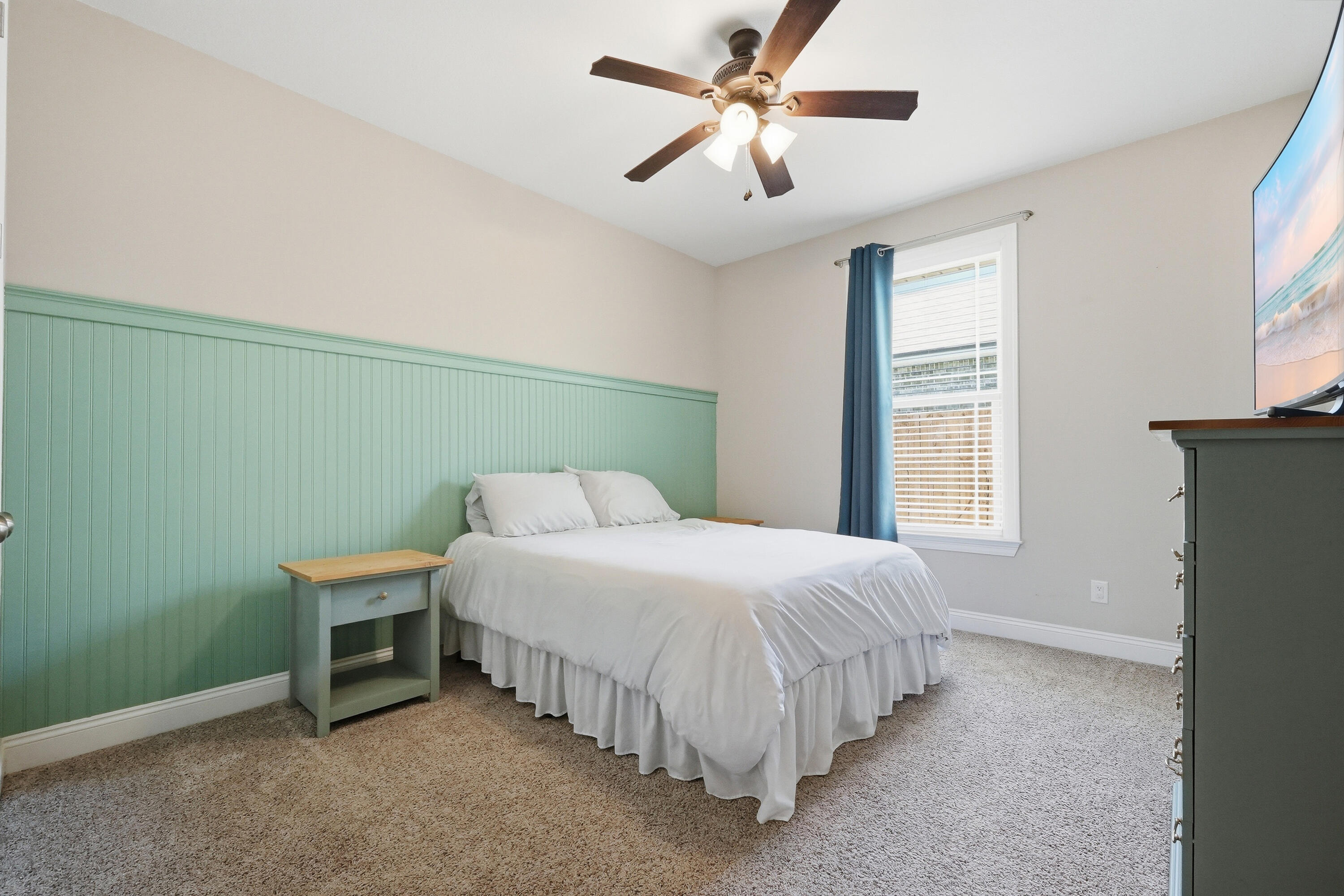 38 Marlborough Road Shalimar, FL 32579 - Photo 52 of 68 a bedroom with a bed and a ceiling fan