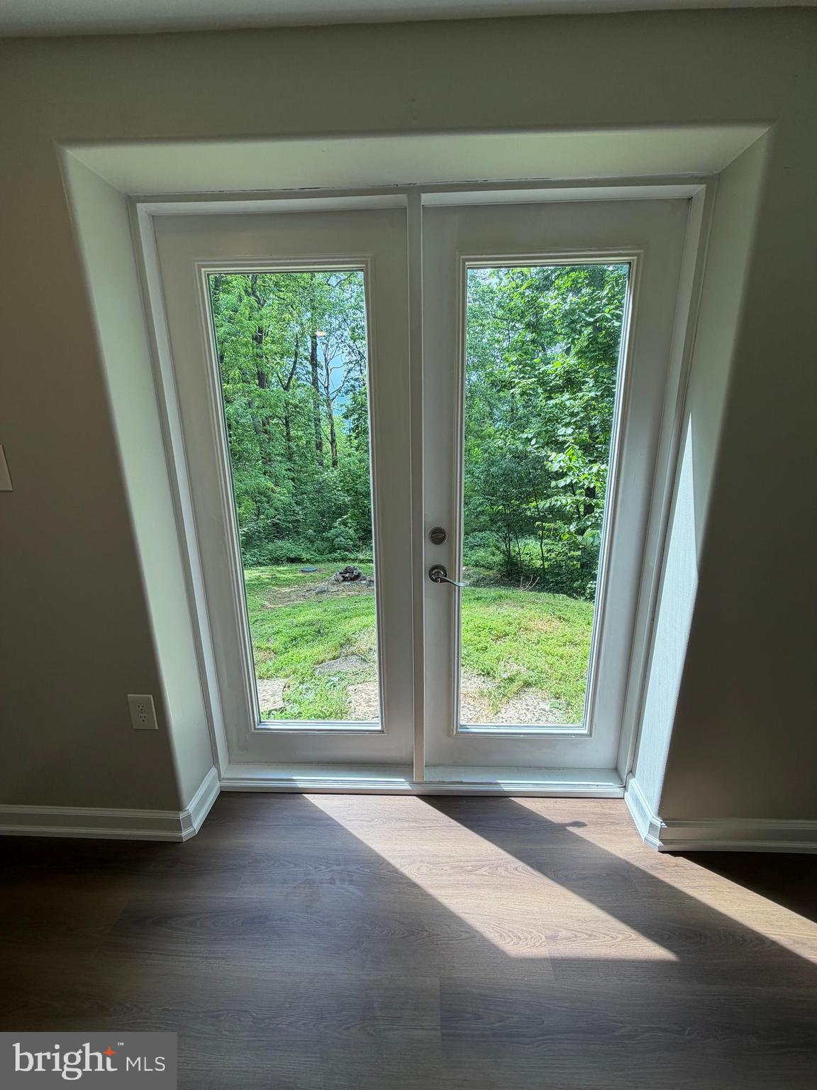 146 Trillium Trail Road Linden, VA 22642 - Photo 18 of 21 a view of an empty room with large windows
