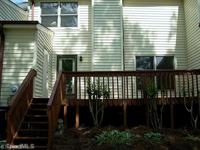 1719 Ternberry Road High Point, NC 27262 - Photo 14 of 14 Exterior Back. Back Of House And Deck Overview From Backyard