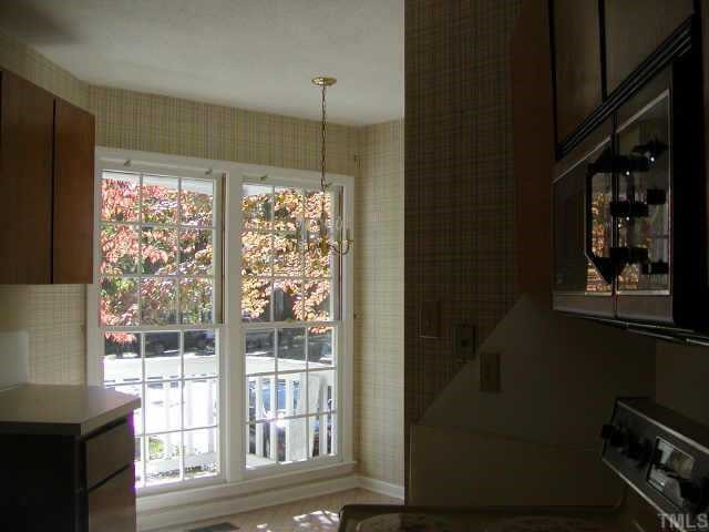 1109 Esher Court Raleigh, NC 27609 - Photo 8 of 8 VIEW OF KITCHEN WITH SUNNY WINDOW ON THE FRONT OF THE TOWNHOUSE Other