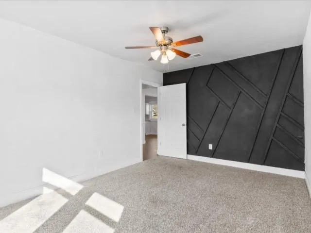 a view of a livingroom with a fan