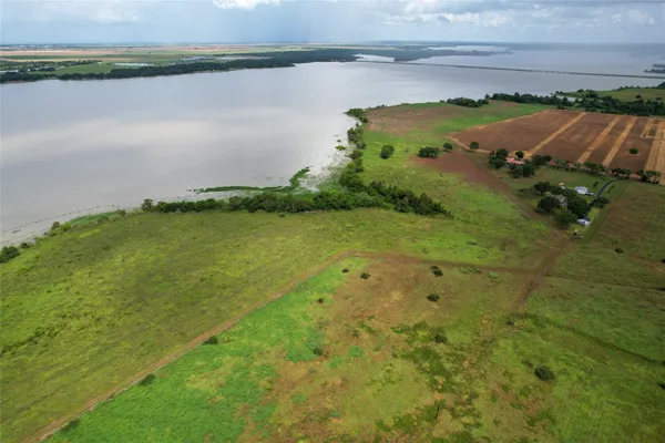 a view of a lake with outdoor space