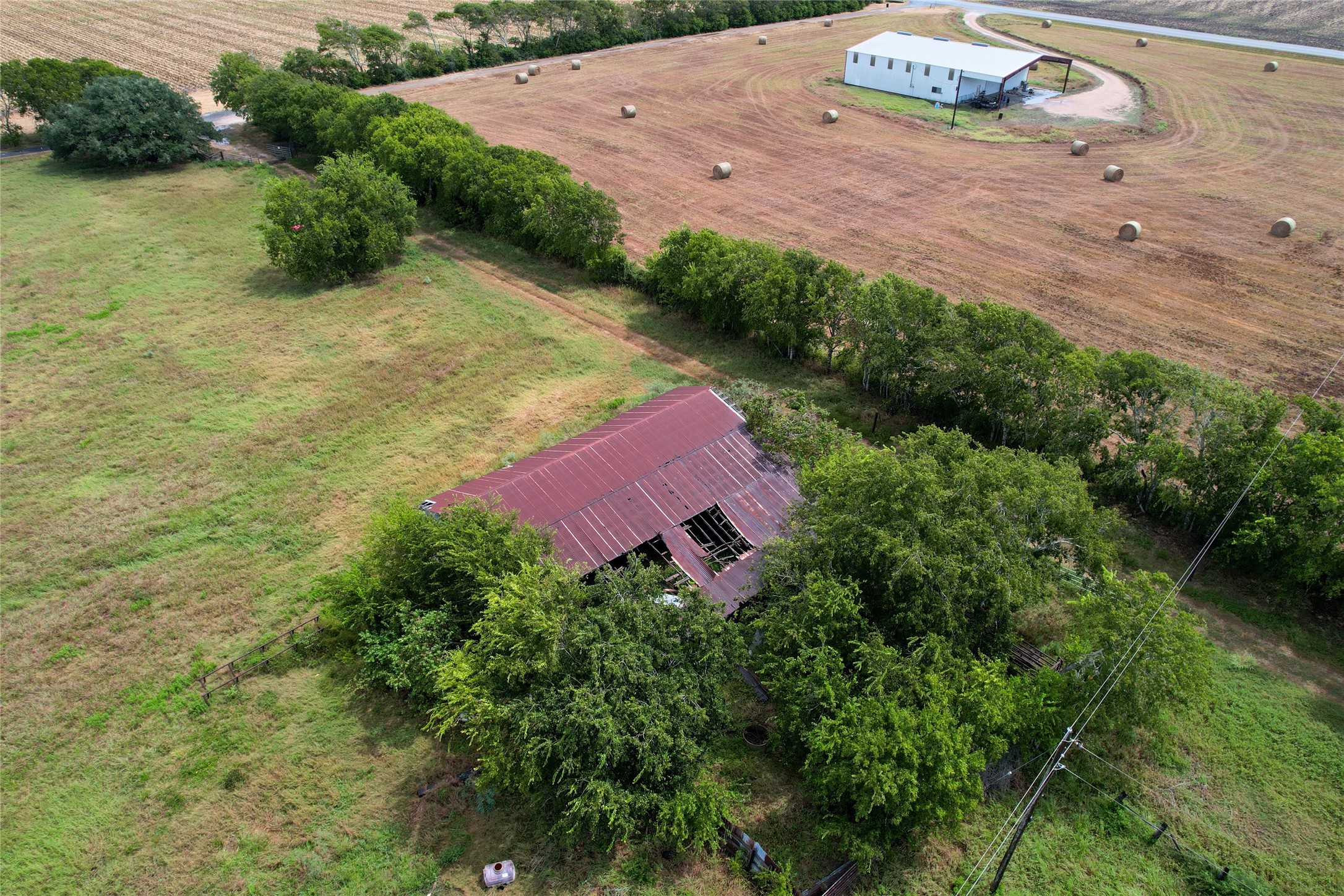 0 F M 1593 Ganado, TX 77962 - Photo 18 of 40 an aerial view of a house with a yard