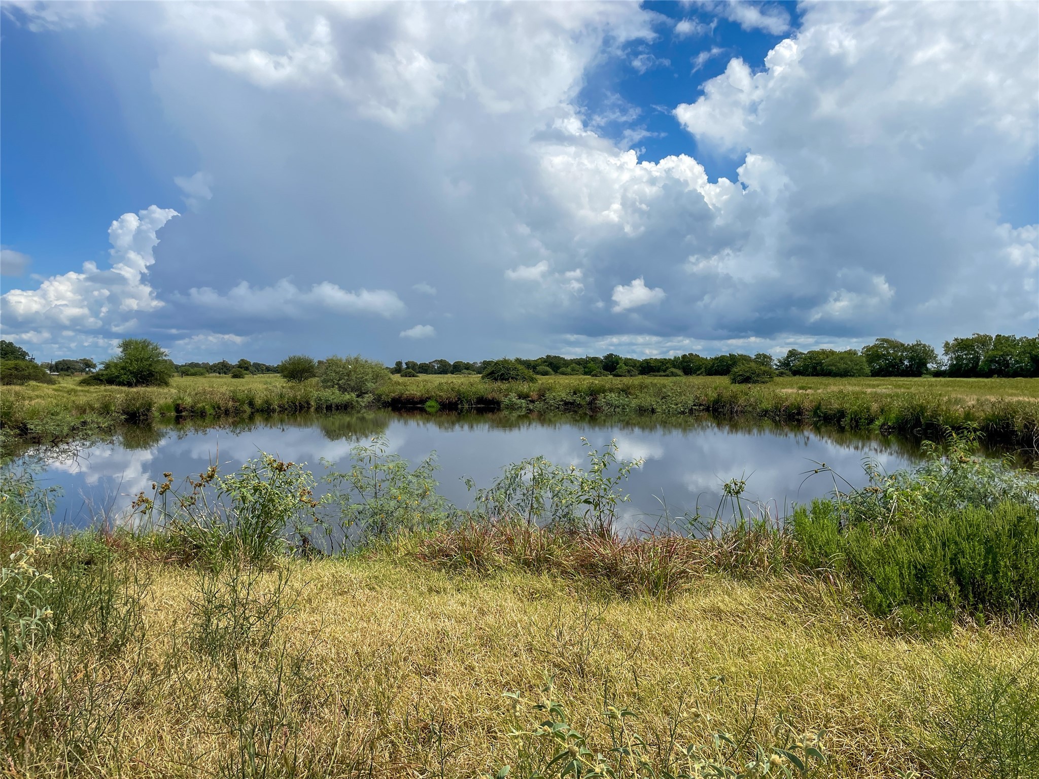 0 F M 1593 Ganado, TX 77962 - Photo 20 of 40 a view of a lake with houses in the back