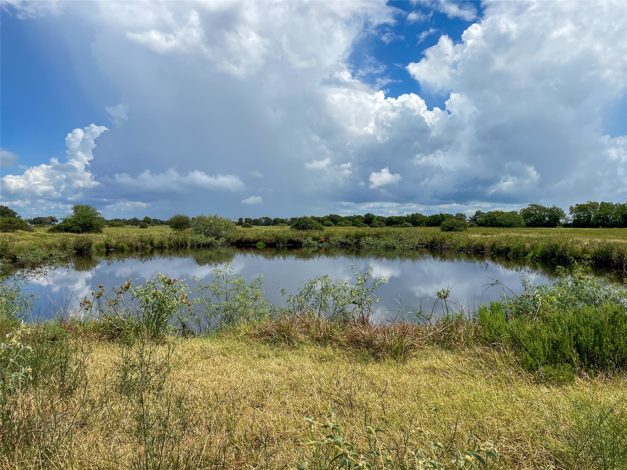 0 F M 1593 Ganado, TX 77962 - Photo 20 of 40 a view of a lake with houses in the back