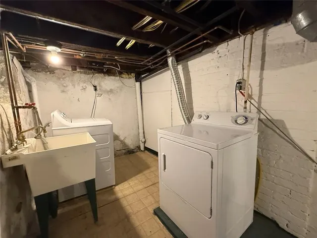 a front view of a house with a garage