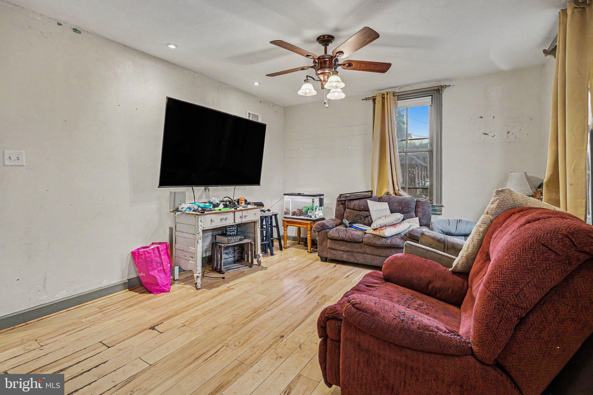 61 Mayfield Street Dover, PA 17315 - Photo 13 of 26 Cozy living space with natural light.