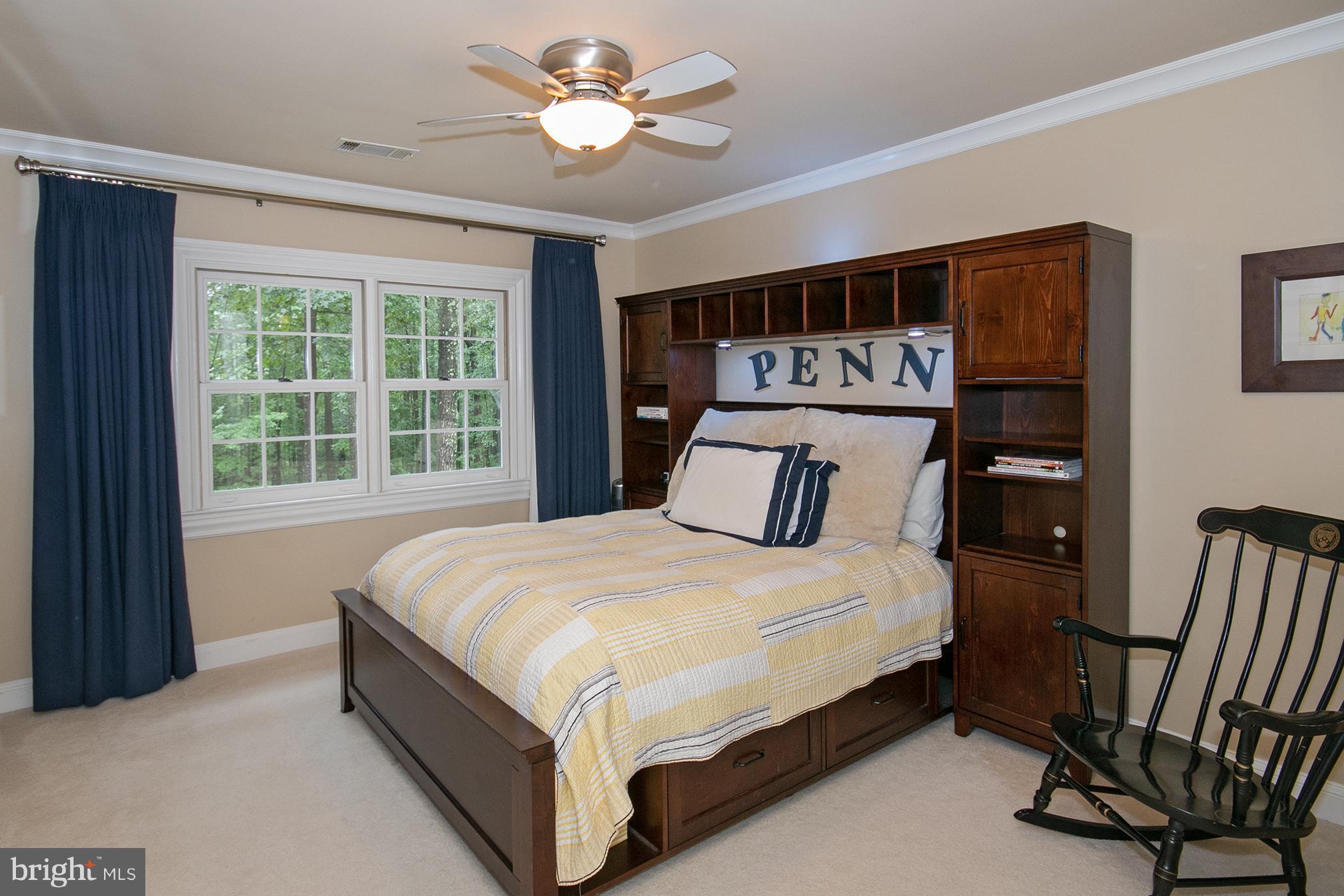 684 Springvale Road Great Falls, VA 22066 - Photo 14 of 27 a bedroom with a bed and a window