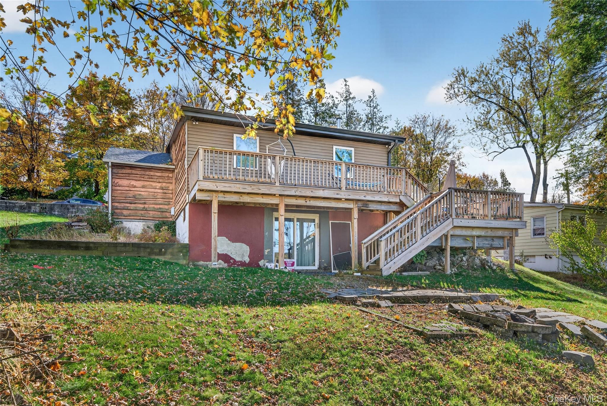 469 Hillside Road Monroe, NY 10950 - Photo 42 of 44 a front view of a house with a garden and trees