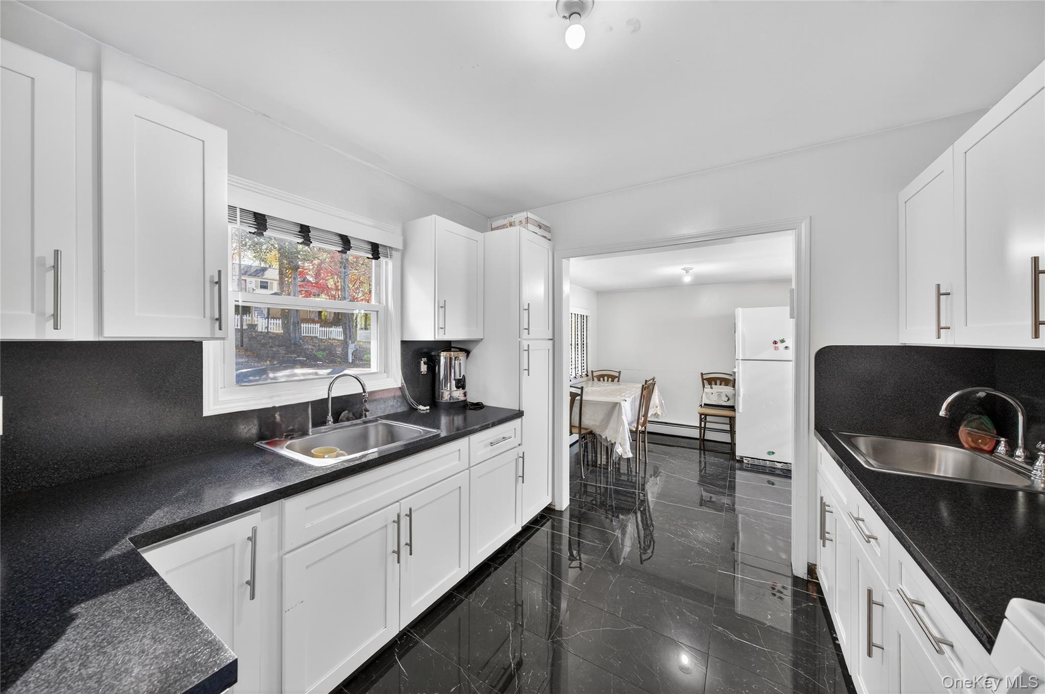 469 Hillside Road Monroe, NY 10950 - Photo 6 of 44 a kitchen with stainless steel appliances kitchen island granite countertop a sink stove and cabinets