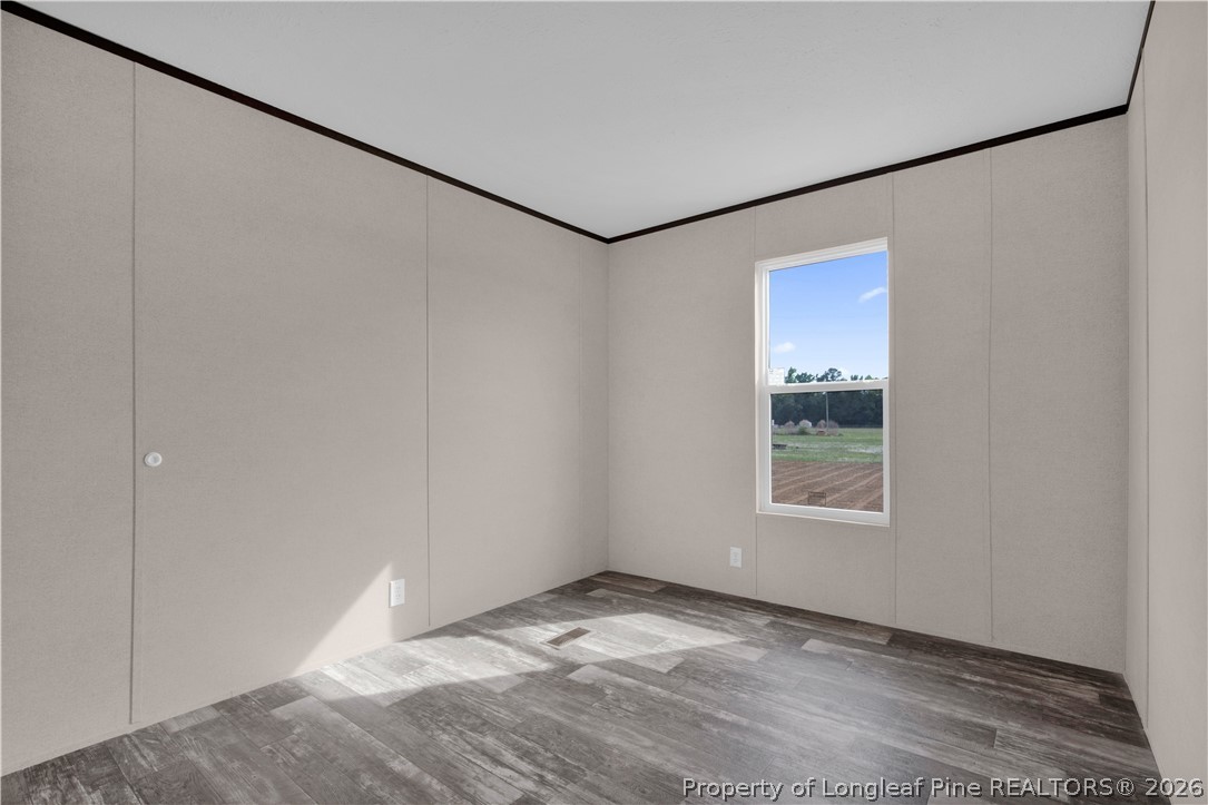 6309 Deep Branch Road Pembroke, NC 28372 - Photo 23 of 32 a view of an empty room with a window