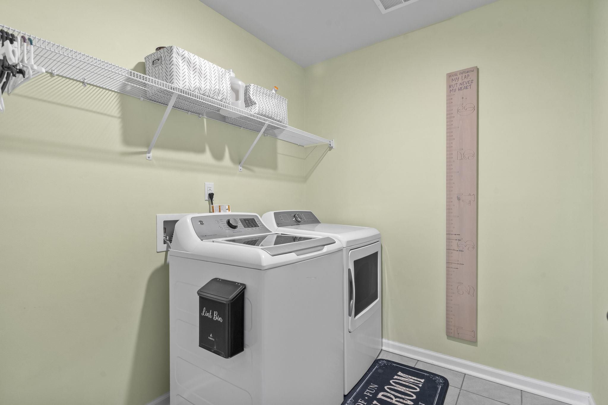 2605 Muhly Court Conway, SC 29526 - Photo 15 of 33 Washroom with tile patterned flooring and washing machine and dryer