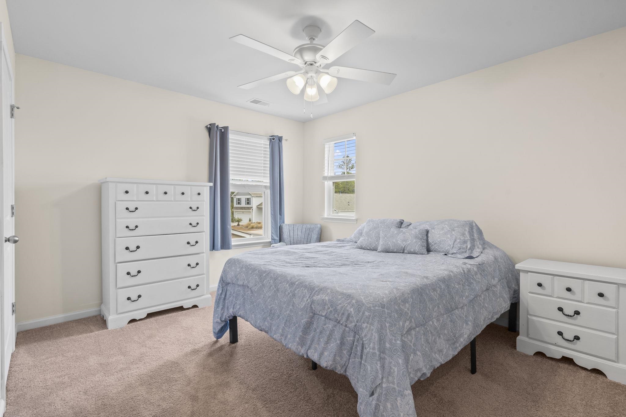2605 Muhly Court Conway, SC 29526 - Photo 18 of 33 Carpeted bedroom with a ceiling fan