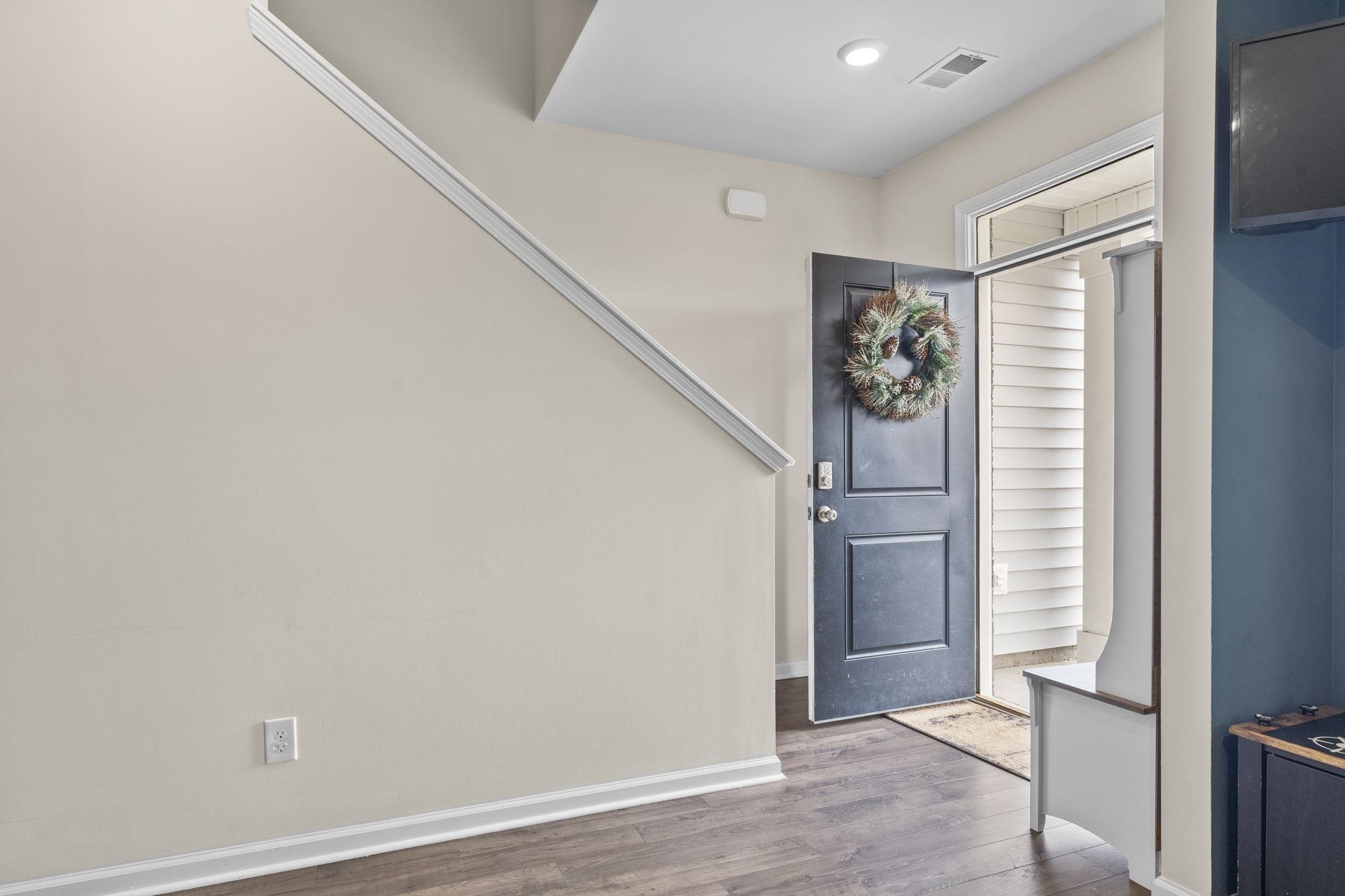 2605 Muhly Court Conway, SC 29526 - Photo 2 of 33 Foyer with baseboards and wood finished floors