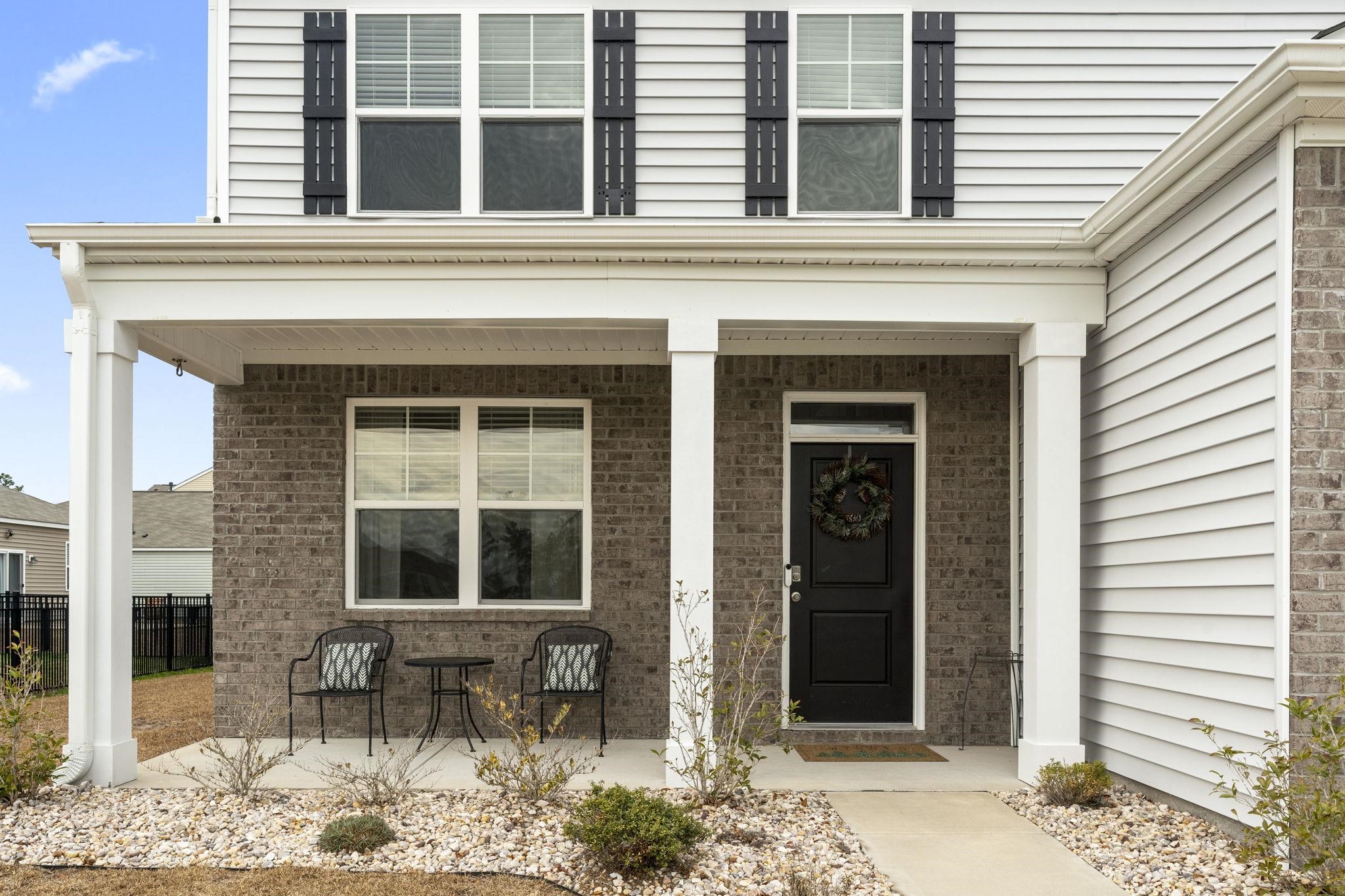 2605 Muhly Court Conway, SC 29526 - Photo 30 of 33 Property entrance featuring covered porch and brick siding