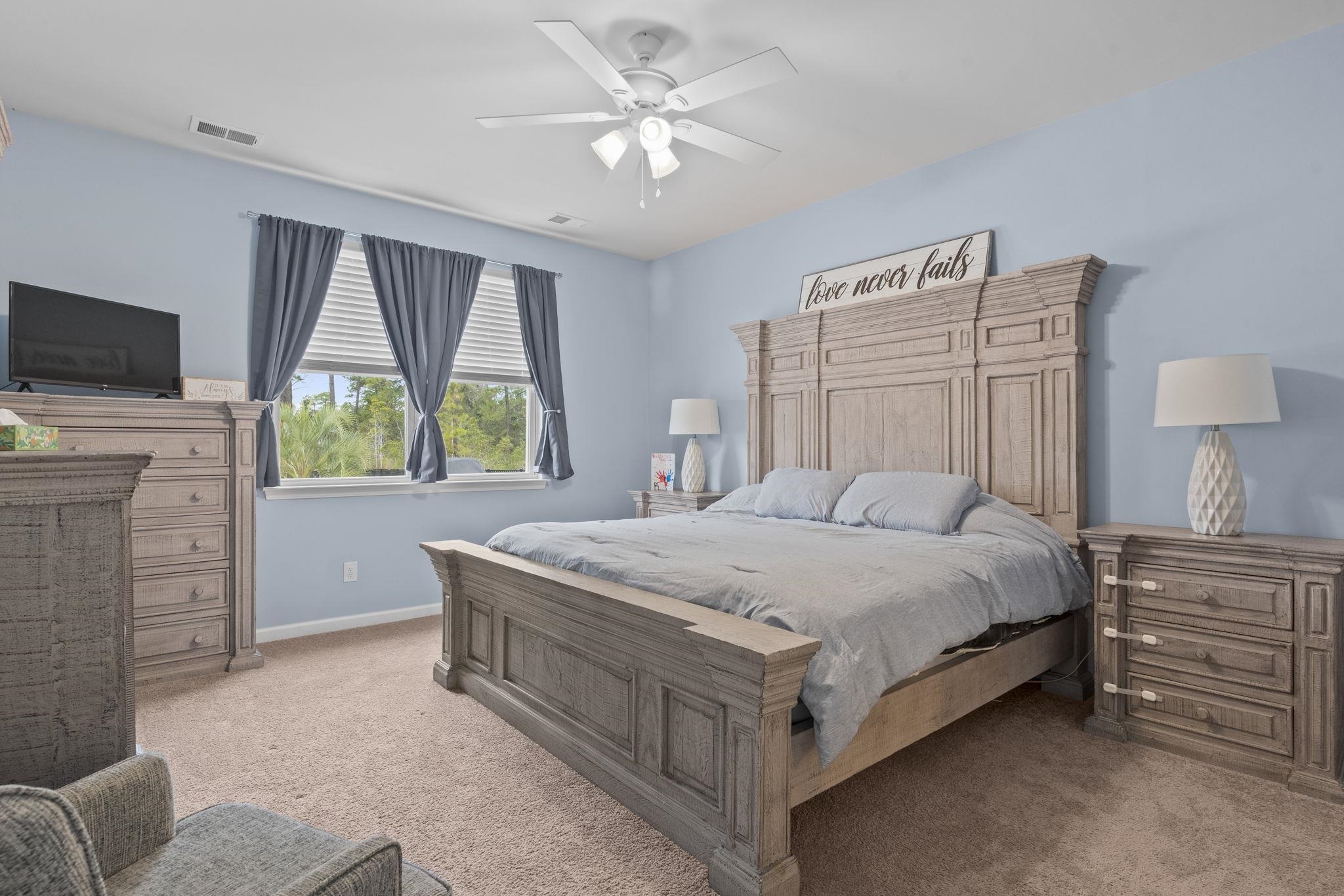 2605 Muhly Court Conway, SC 29526 - Photo 10 of 33 Bedroom featuring light colored carpet and a ceiling fan