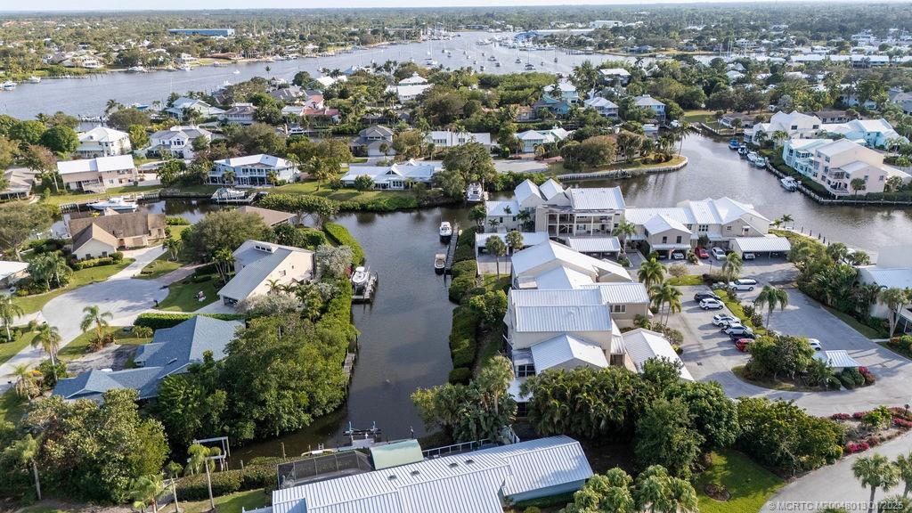 3901 Southeast St Lucie Boulevard, Unit 75 Stuart, FL 34997 - Photo 45 of 48 an aerial view of a city with lots of residential buildings