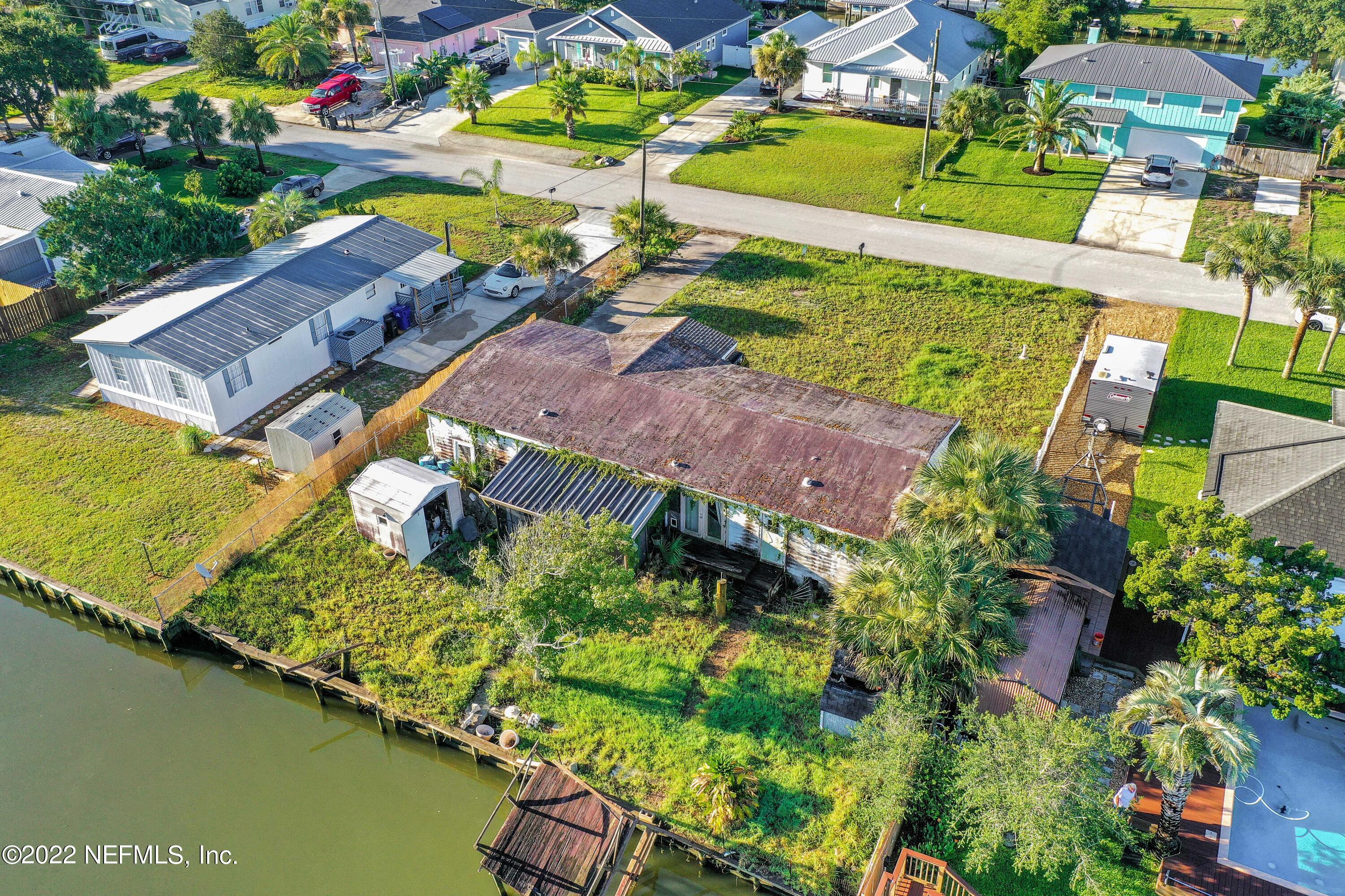 228 Treasure Beach Road St. Augustine, FL 32080 - Photo 7 of 15 an aerial view of residential houses with outdoor space