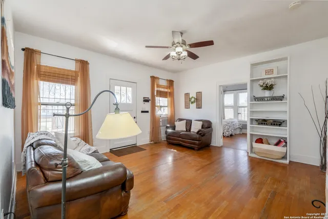 a living room with furniture or couch and a window