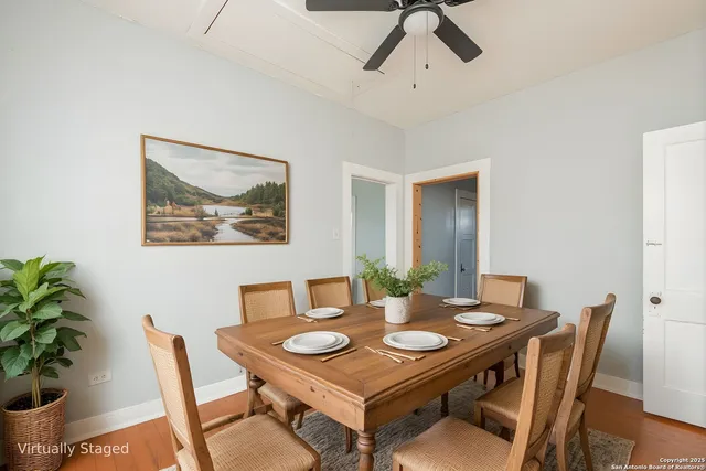 a view of a dining room with furniture
