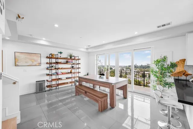 a room with furniture and view of living room