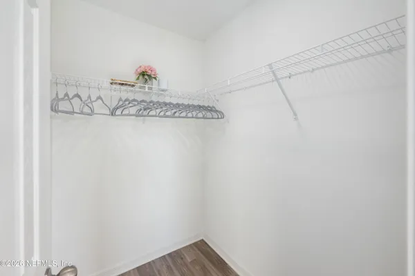 a view of a closet in the kitchen