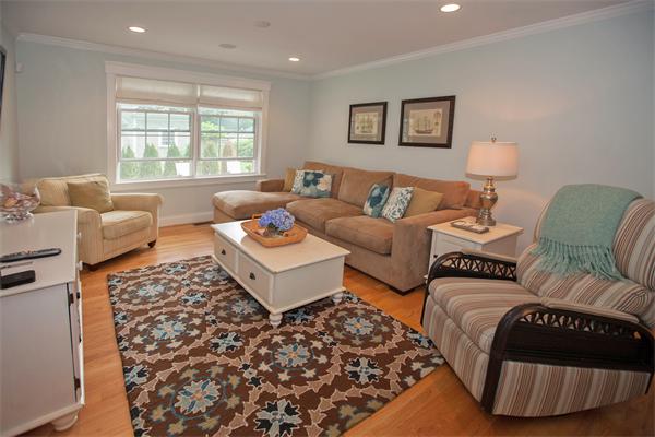 20 Grasshopper Lane Scituate, MA 02066 - Photo 13 of 30 a living room with furniture and a large window