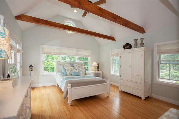 20 Grasshopper Lane Scituate, MA 02066 - Photo 20 of 30 a bedroom with a bed and a large window