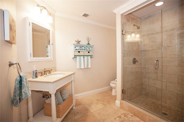 20 Grasshopper Lane Scituate, MA 02066 - Photo 21 of 30 a bathroom with a sink a toilet a mirror and shower