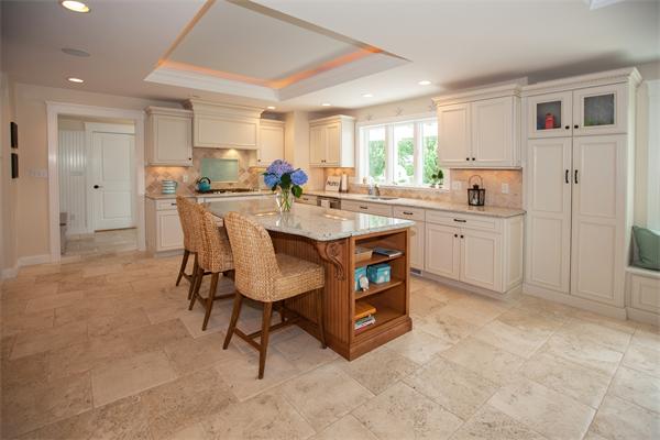 20 Grasshopper Lane Scituate, MA 02066 - Photo 6 of 30 a kitchen with kitchen island a stove a table and chairs in it