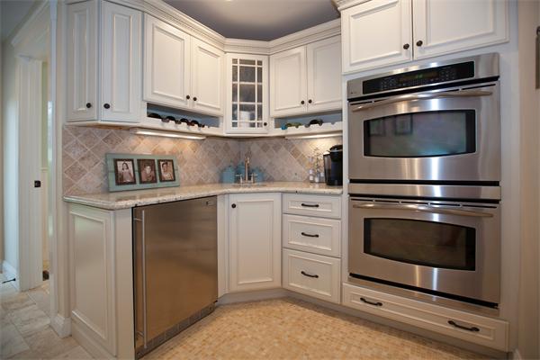 20 Grasshopper Lane Scituate, MA 02066 - Photo 10 of 30 a kitchen with stainless steel appliances granite countertop a stove microwave and cabinets