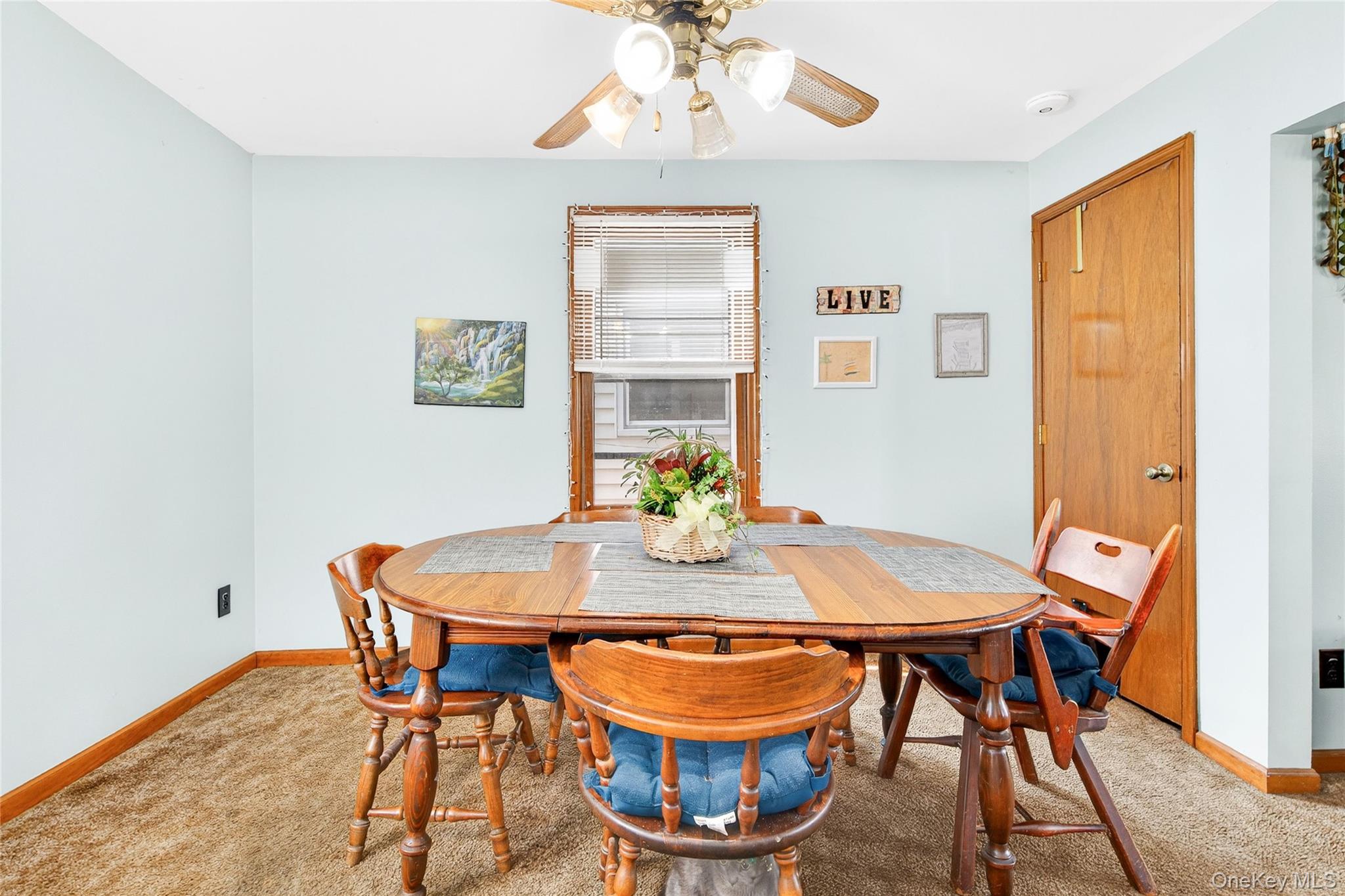 131 Front Street Port Jervis, NY 12771 - Photo 12 of 35 Dining room with light colored carpet, a ceiling fan, and baseboards