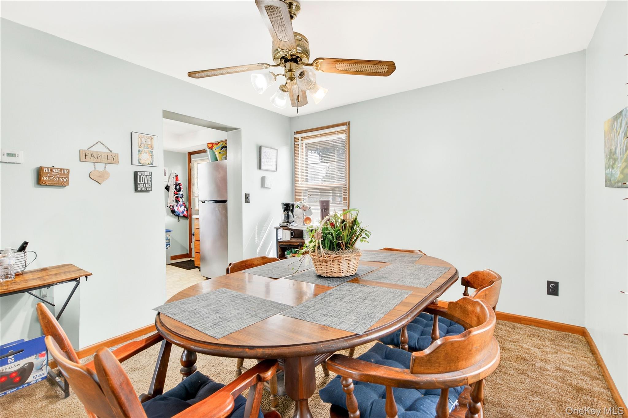 131 Front Street Port Jervis, NY 12771 - Photo 13 of 35 Dining area with baseboards, ceiling fan, and light colored carpet