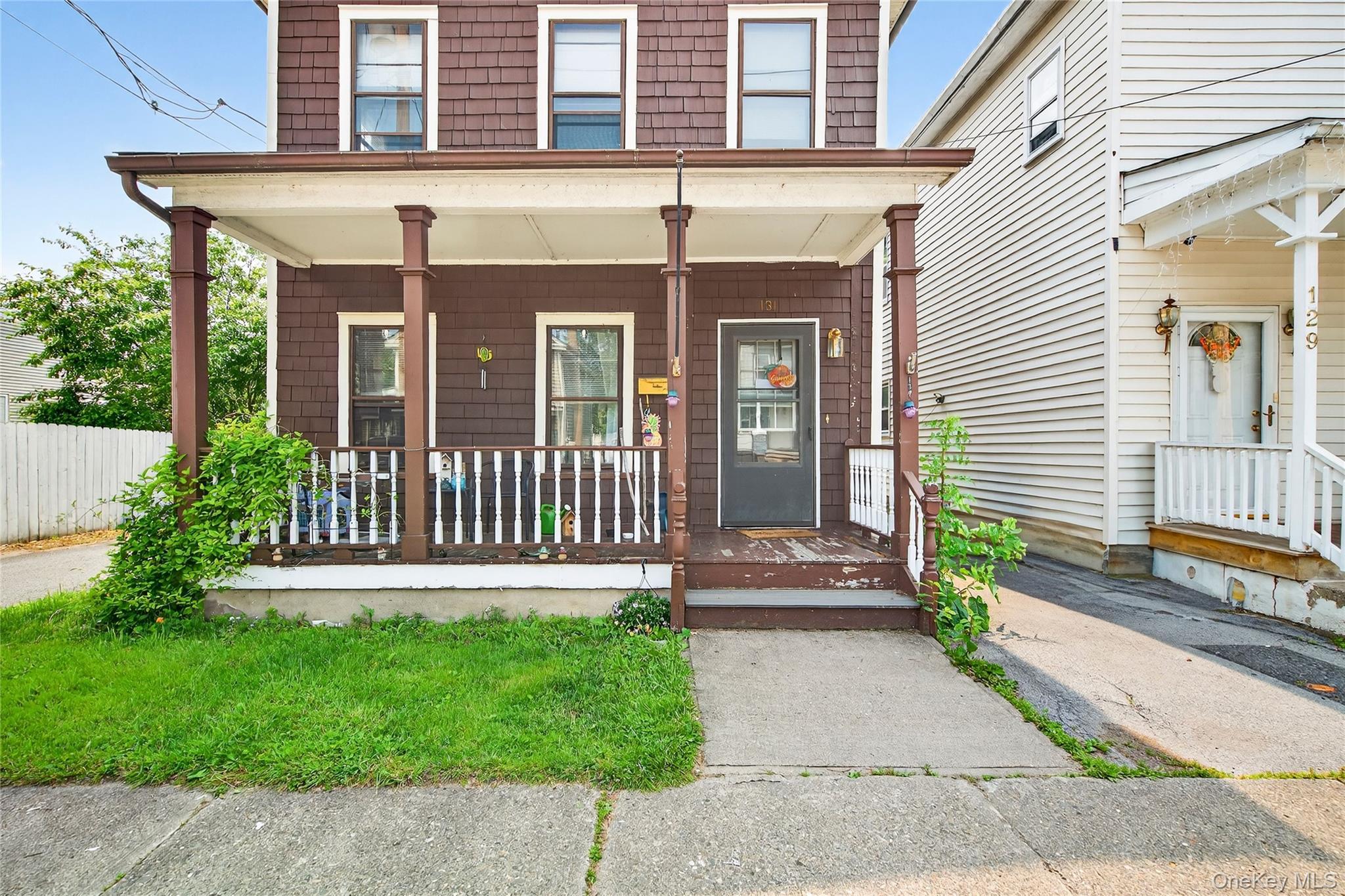 131 Front Street Port Jervis, NY 12771 - Photo 2 of 35 View of front of property featuring covered porch