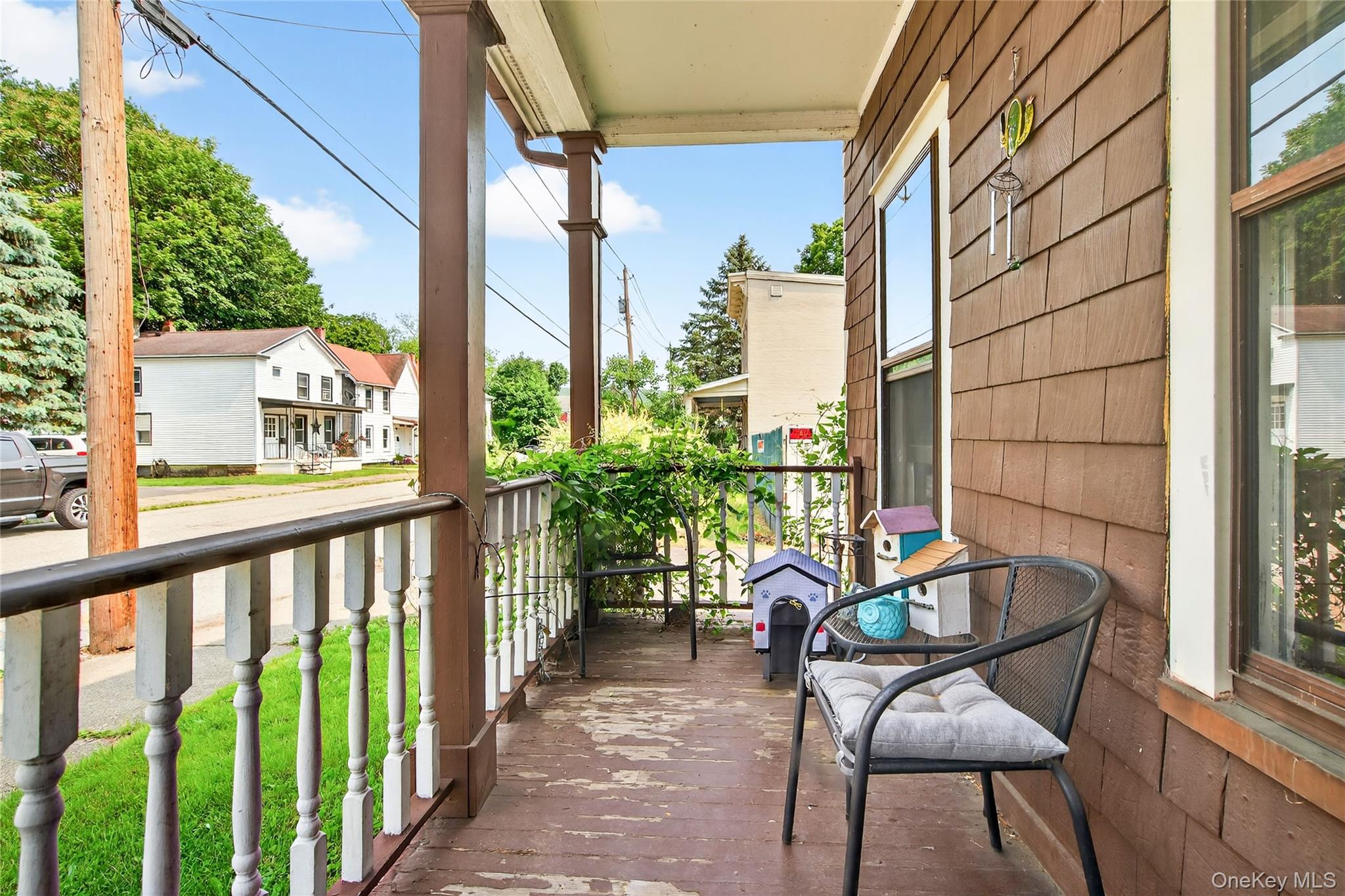 131 Front Street Port Jervis, NY 12771 - Photo 3 of 35 Covered porch featuring a residential view