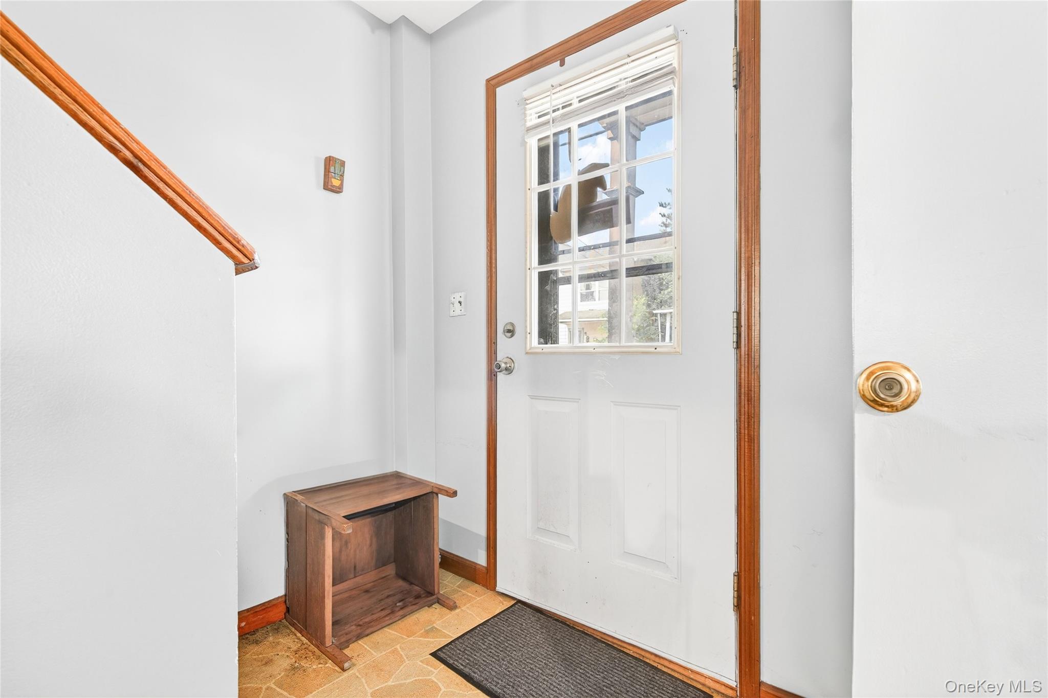 131 Front Street Port Jervis, NY 12771 - Photo 5 of 35 Entryway with baseboards and light stone finish floors