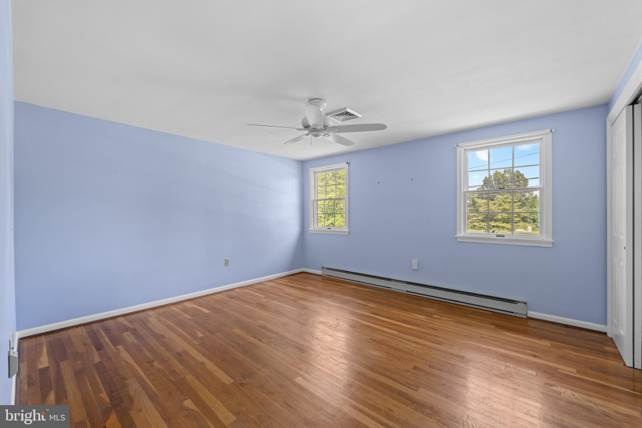 258 Monacy Road Coatesville, PA 19320 - Photo 36 of 54 wooden floor in an empty room with a window