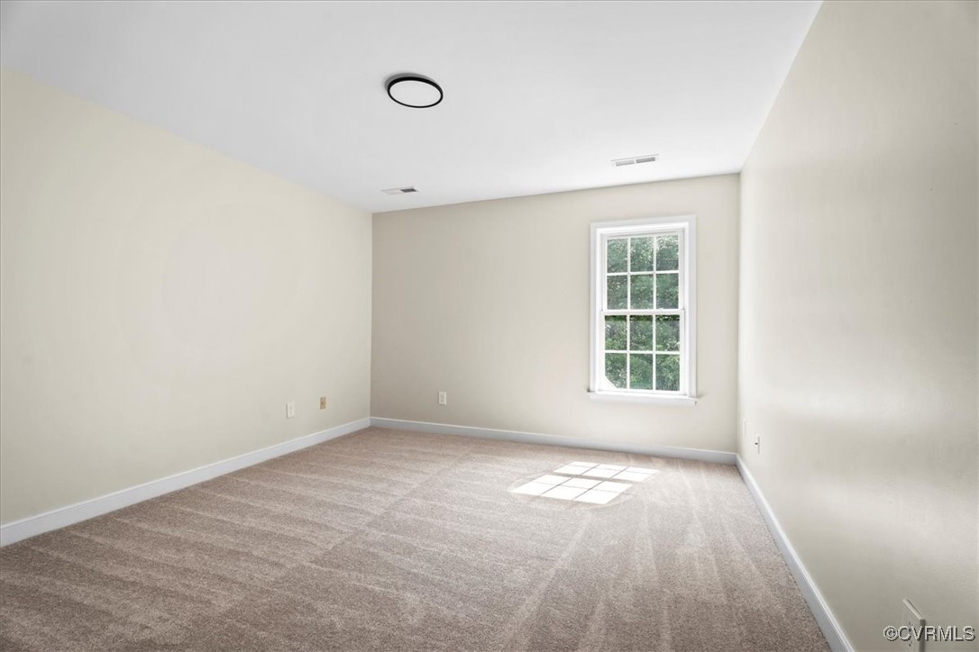 13713 Nile Road Chester, VA 23831 - Photo 19 of 23 Empty room with carpet flooring and baseboards