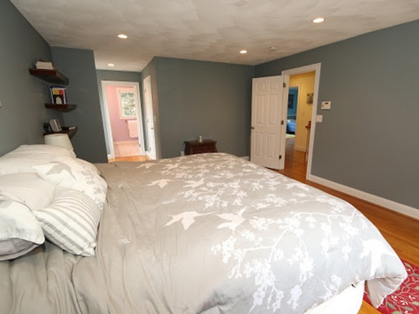5 Melvin Street, Unit B Wakefield, MA 01880 - Photo 16 of 28 a bedroom with a bed and a dresser