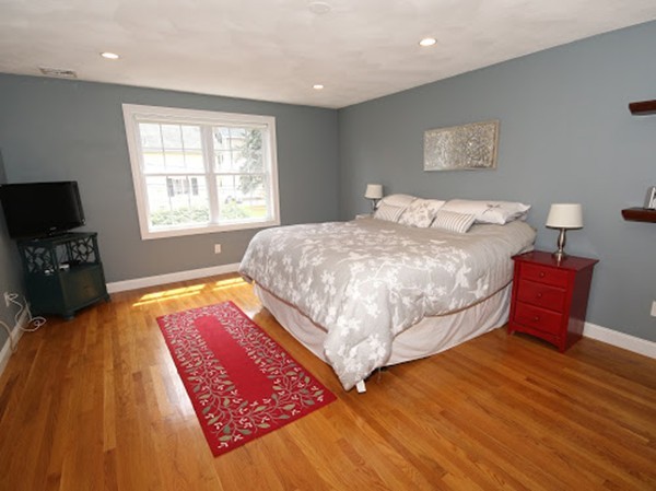 5 Melvin Street, Unit B Wakefield, MA 01880 - Photo 17 of 28 a bedroom with bed and a window