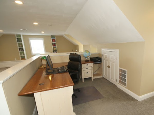 5 Melvin Street, Unit B Wakefield, MA 01880 - Photo 26 of 28 a living room with furniture and a flat screen tv