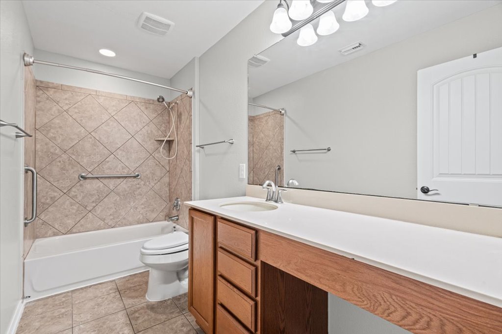 8804 Capitol View Drive Austin, TX 78747 - Photo 30 of 32 a bathroom with a sink a toilet and shower