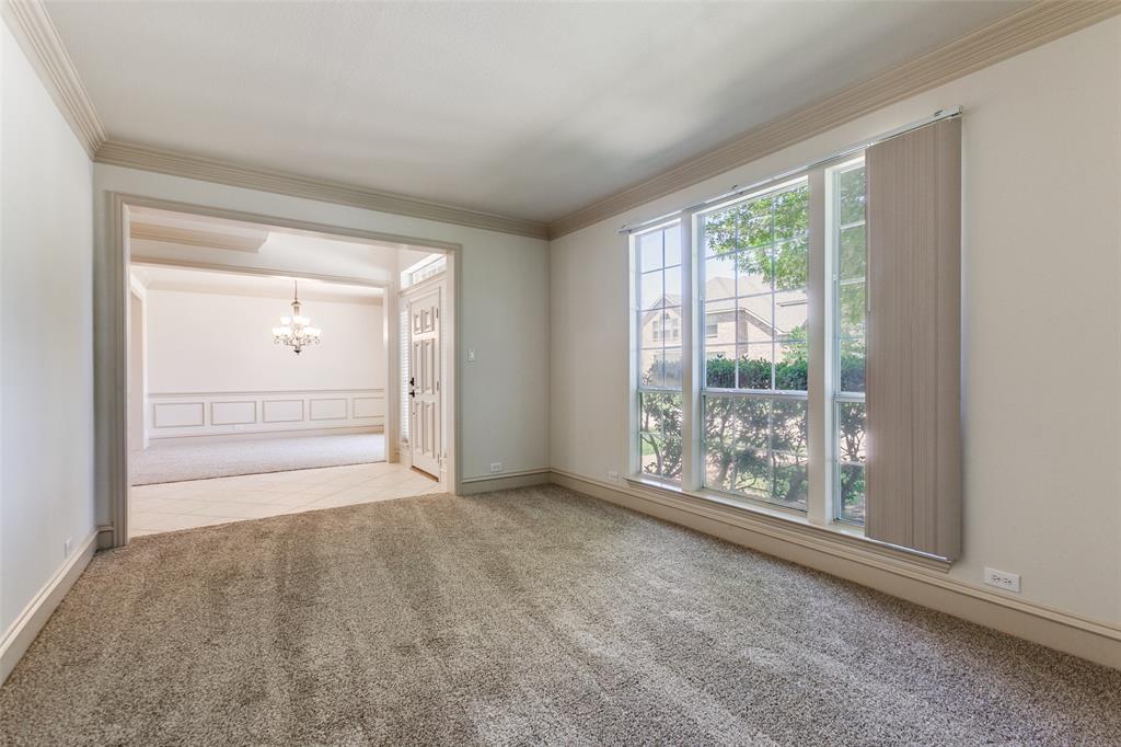 4400 Orchard Gate Lane Plano, TX 75024 - Photo 3 of 12 an empty room with windows and closet