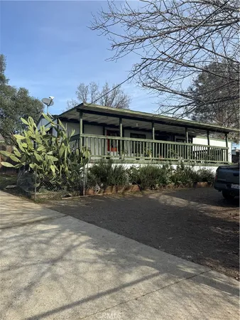 a view of a house with a garden